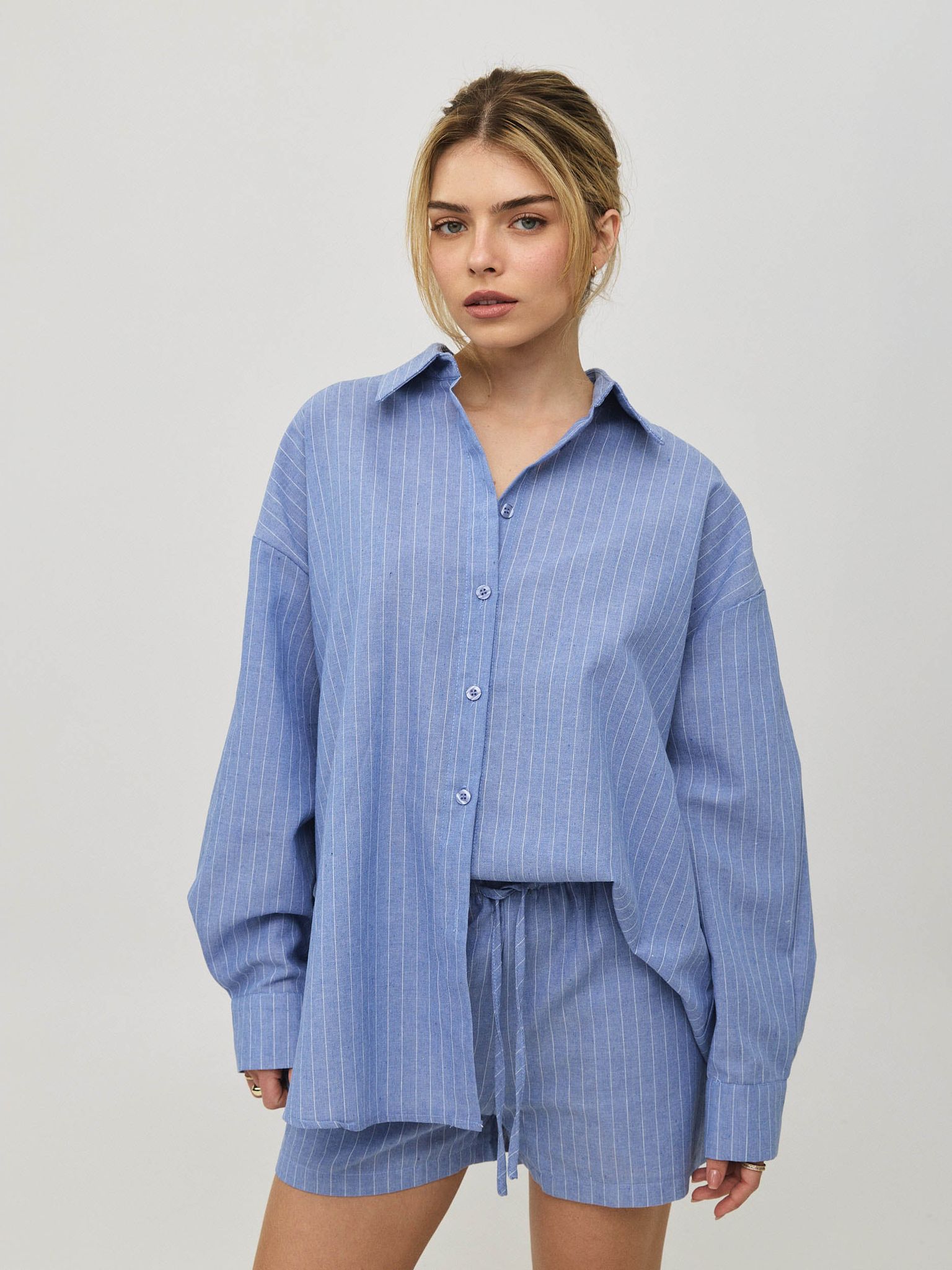 מכופתרת פסים סן