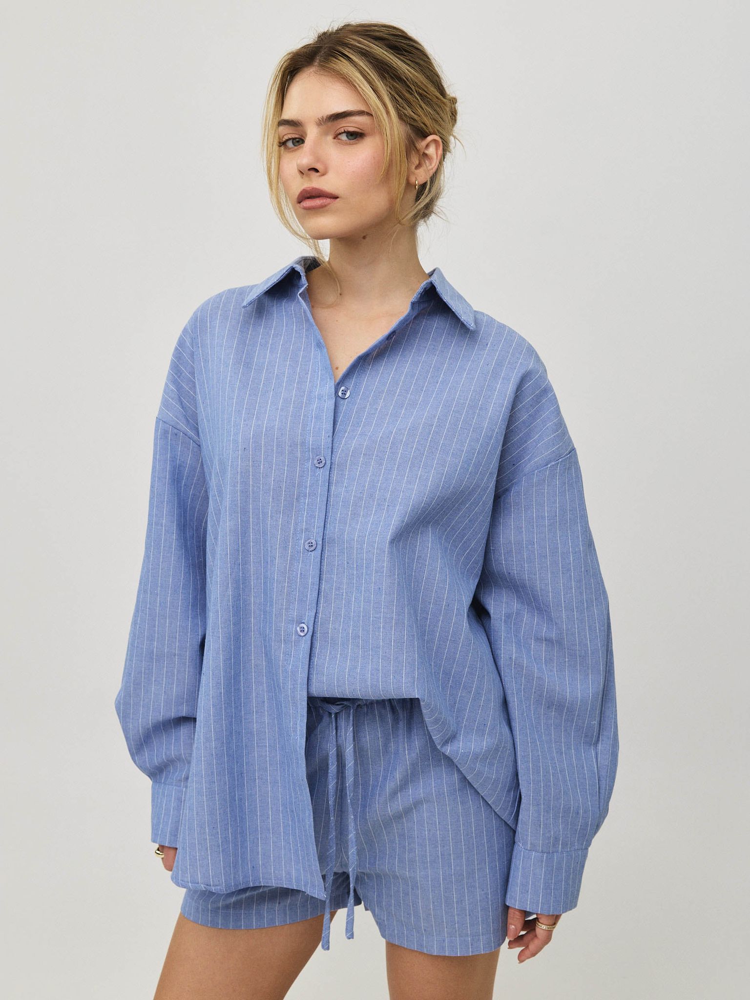 מכופתרת פסים סן