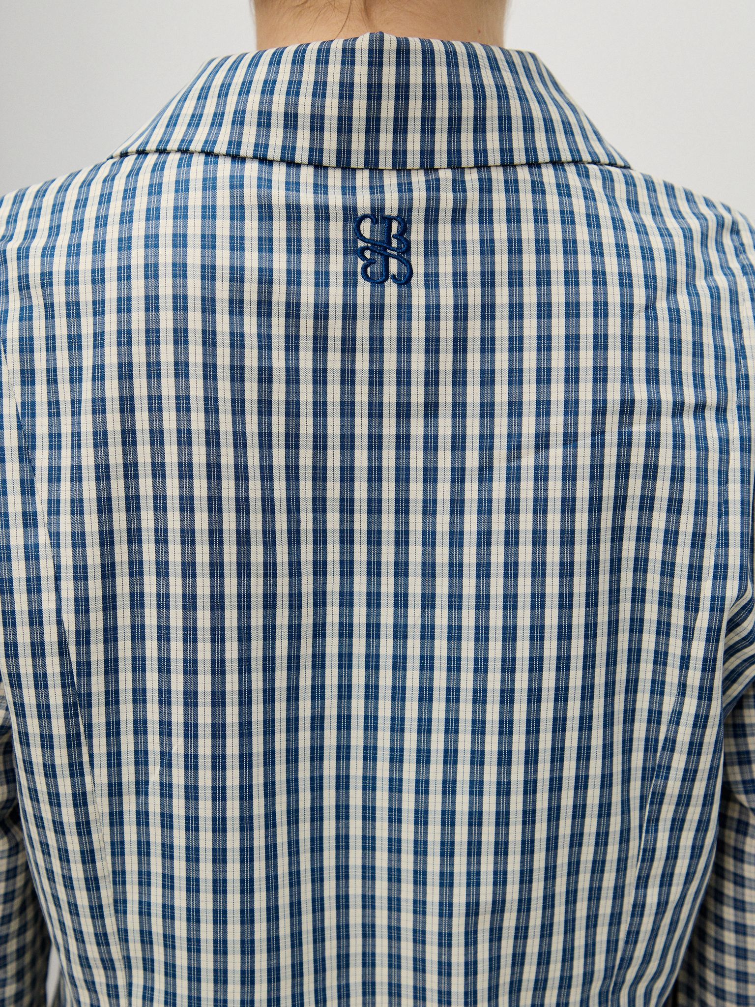 מכופתרת דריה משבצות