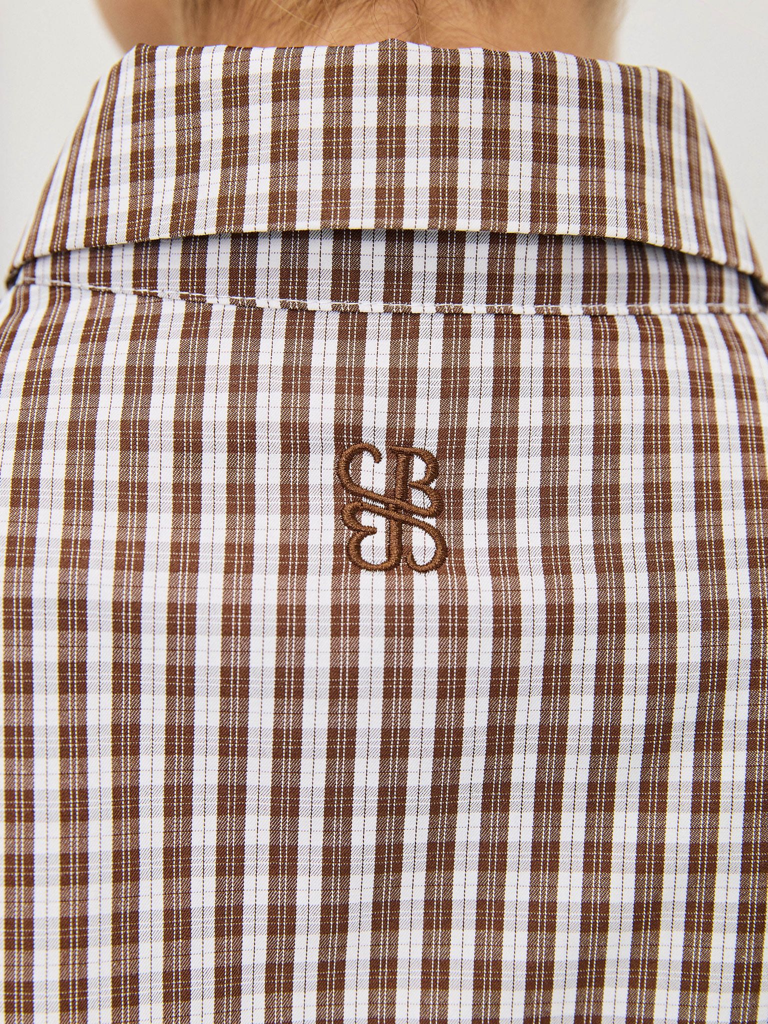 מכופתרת דריה משבצות